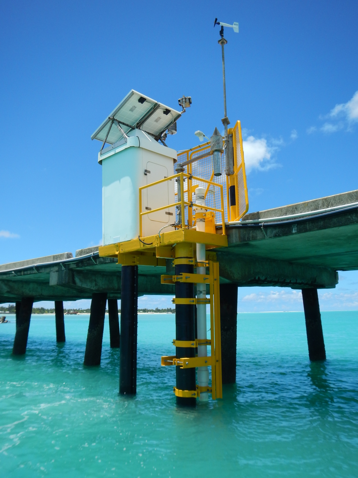 Kiribati Tide Station, a sea level gauge on a wooden deck